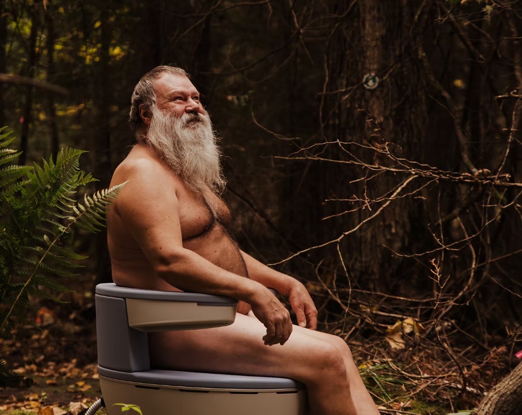 Patient seated on the Emsella chair